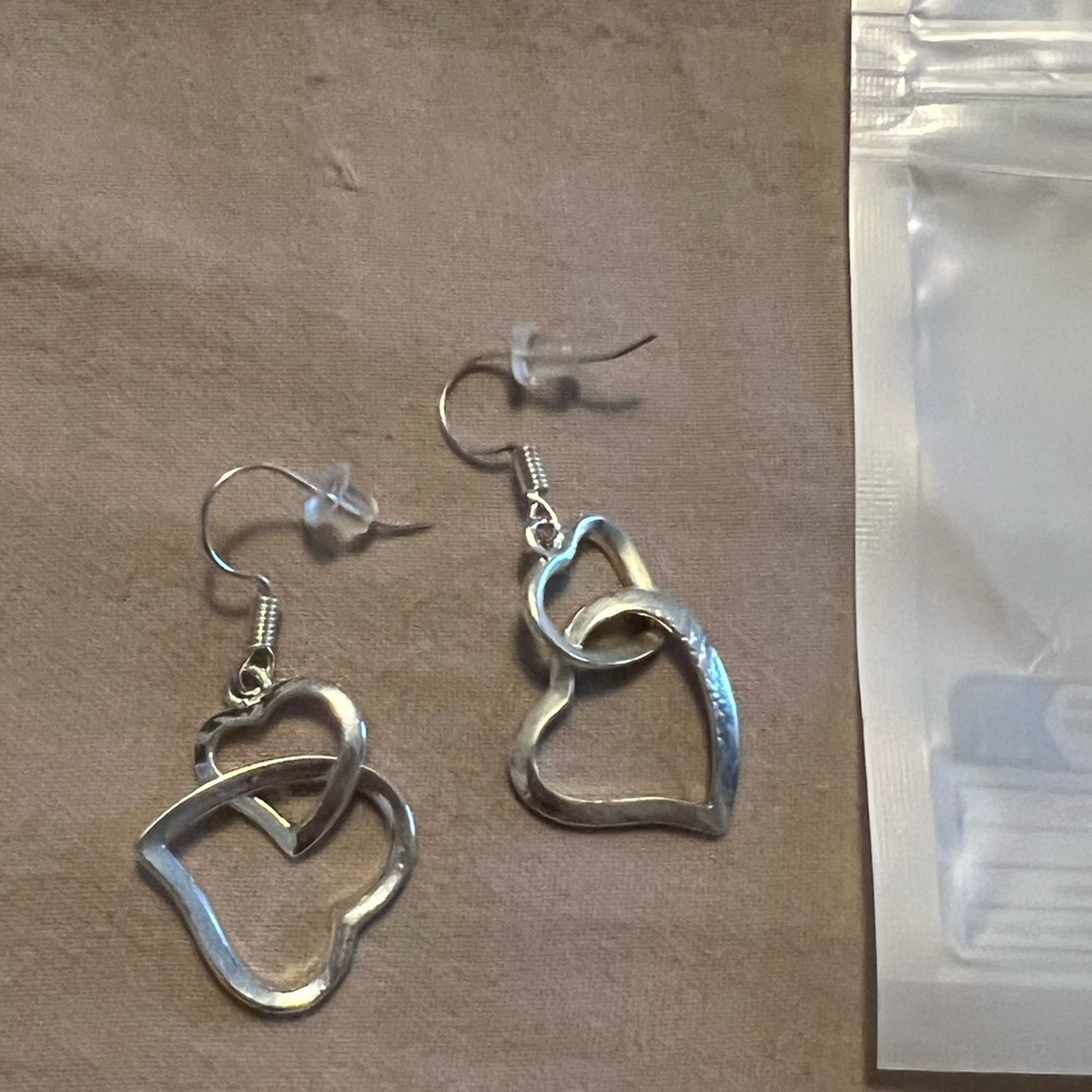 Double heart earrings are brand new